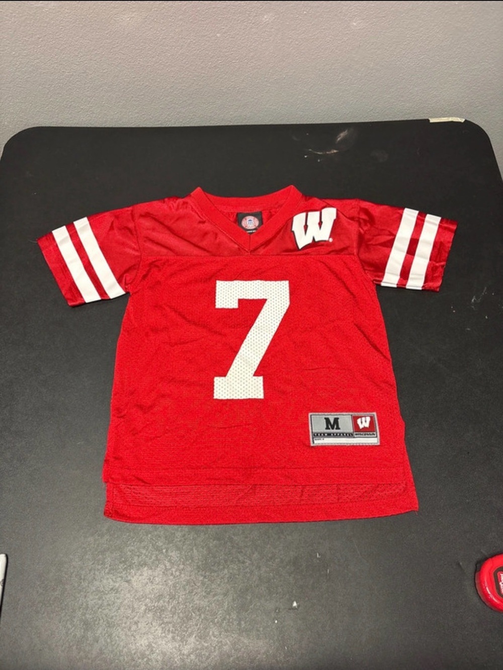 Wisconsin Badgers YOUTH Genuine Stuff Football Jersey, Size Medium